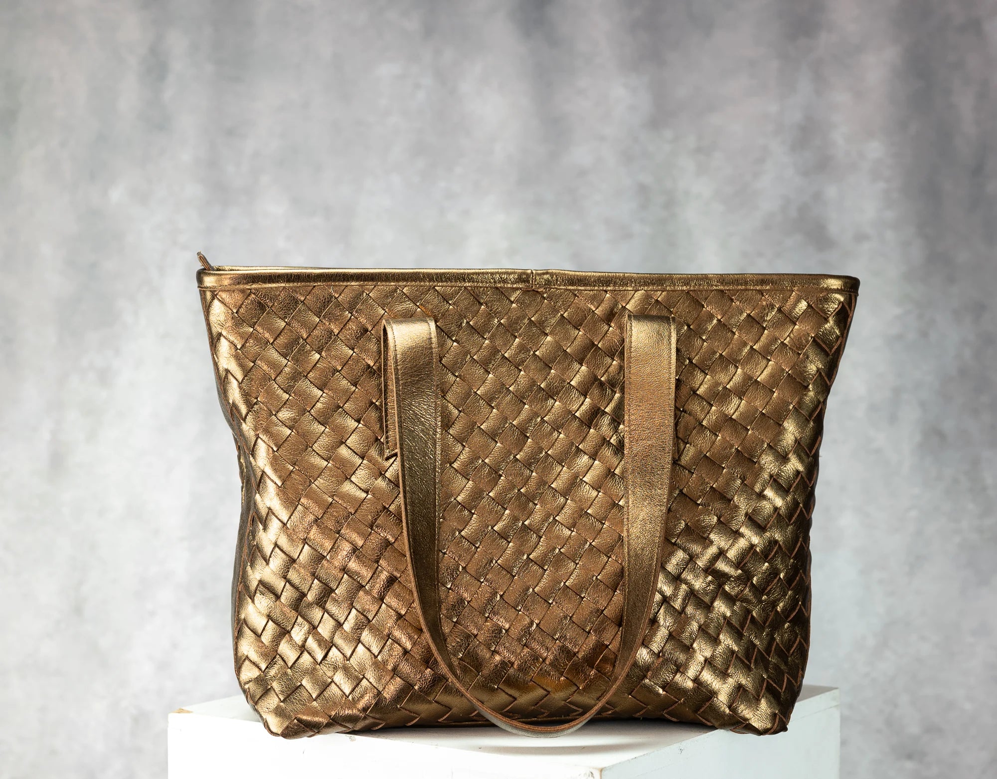 Gold woven handbag