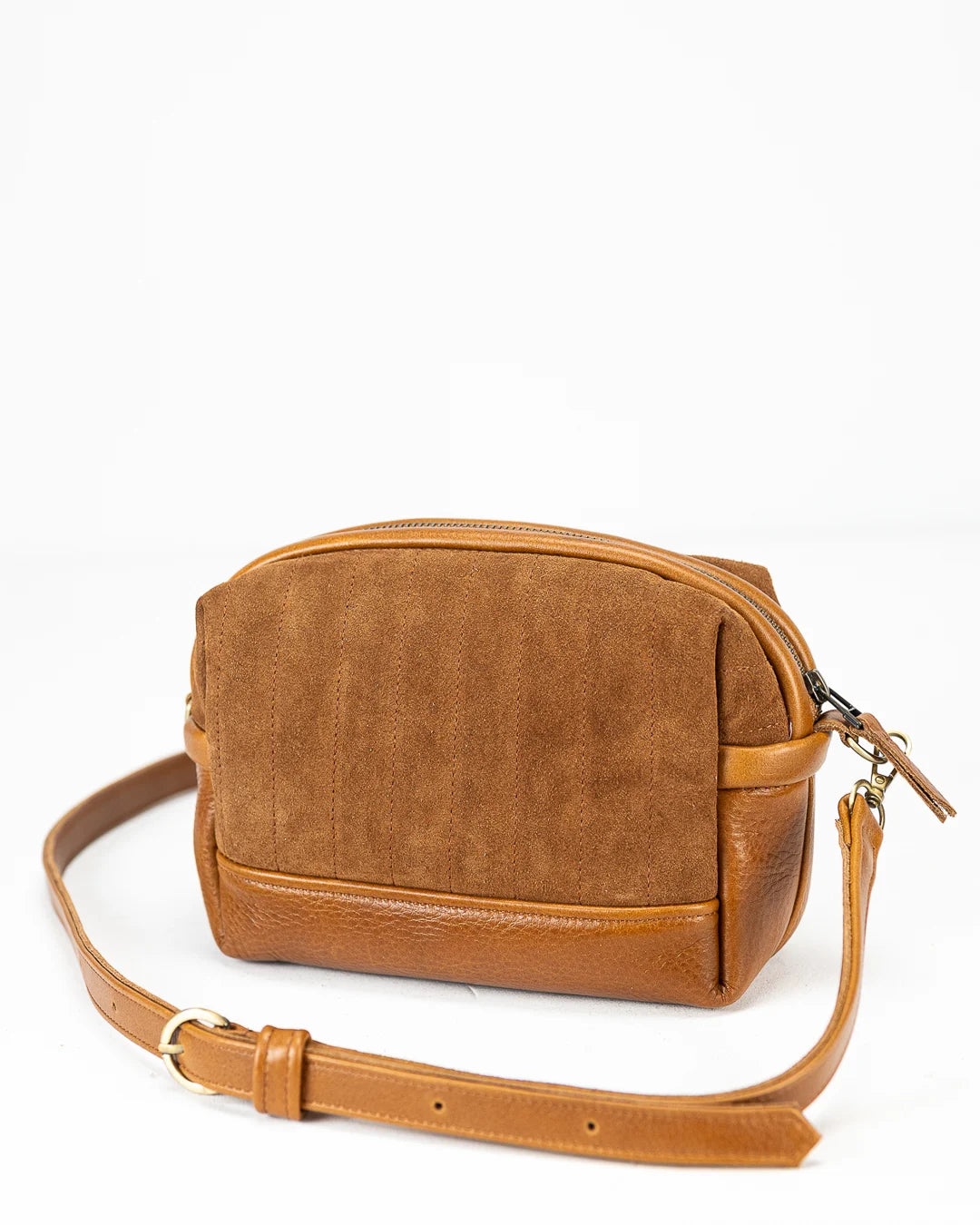Brown leather crossbody bag on a white background