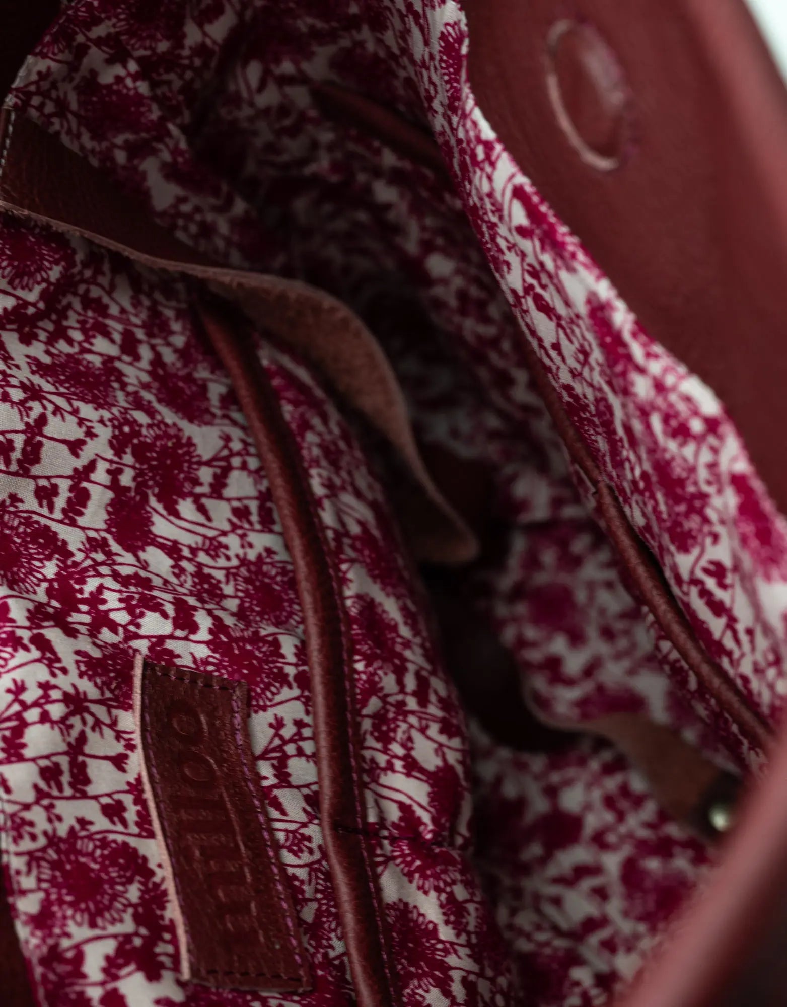 burgundy leather textured bag