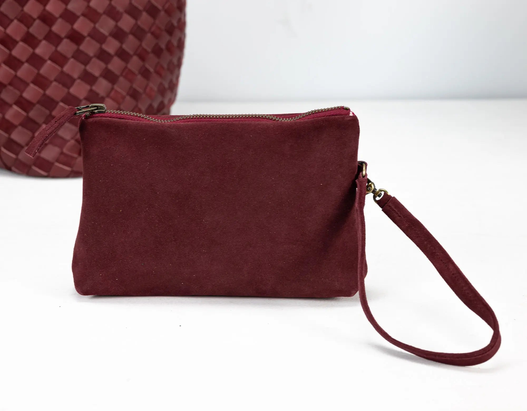 burgundy leather clutch