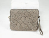 Woven gray clutch bag on a white background