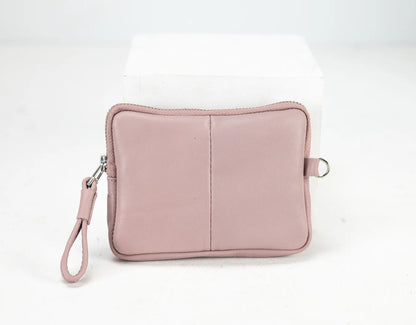Pink pouch with a strap on a white background