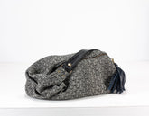 Gray textured bag with black accents on a white background