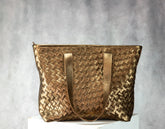 Gold woven handbag 