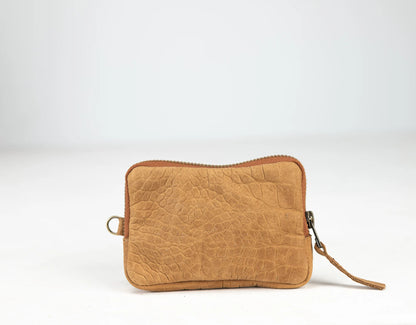 Brown leather clutch bag on a white background