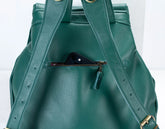Green leather backpack with a zipper on a white background