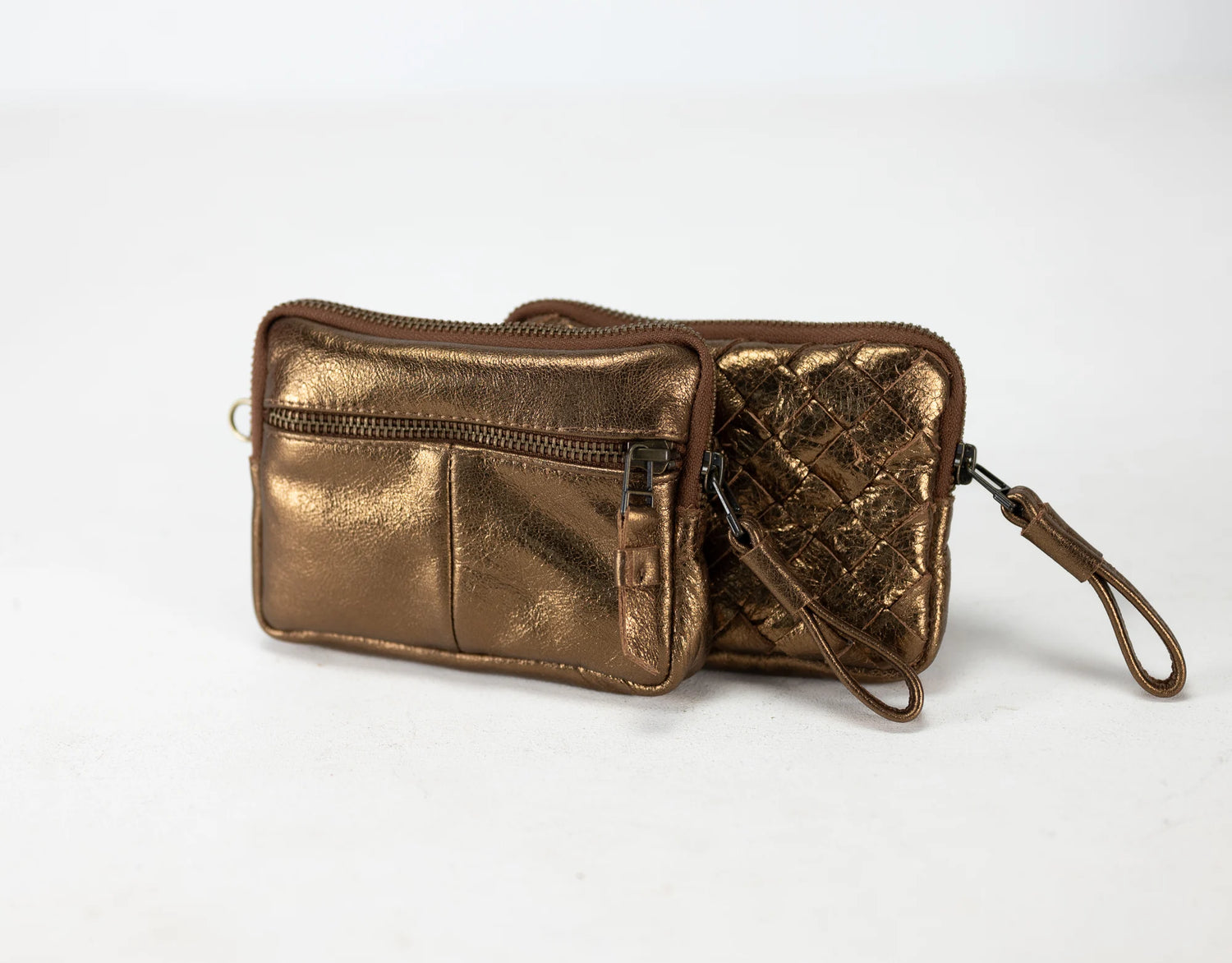 Bronze metallic wallet with a strap on a white background