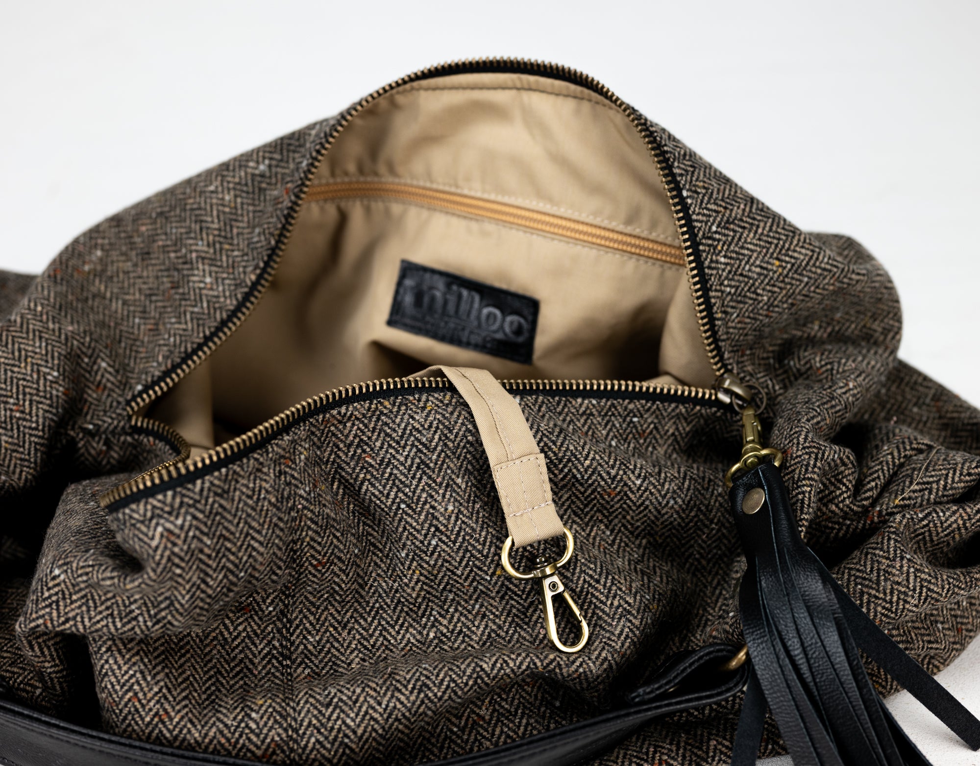 Brown textured bag with a visible brand label on a white background