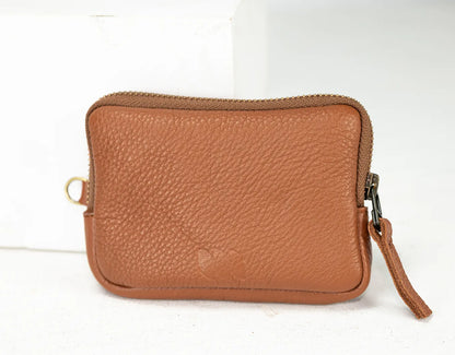 Brown leather wallet with a strap on a white background