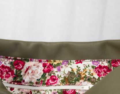 Floral-patterned belt bag with a plain background