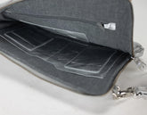 Gray bag with a compartmentalized interior on a white background