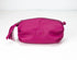 Pink pouch with a tassel on a white background