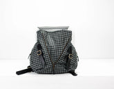 Houndstooth pattern backpack on a white background