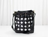 Black and white checkered bucket bag on a white background