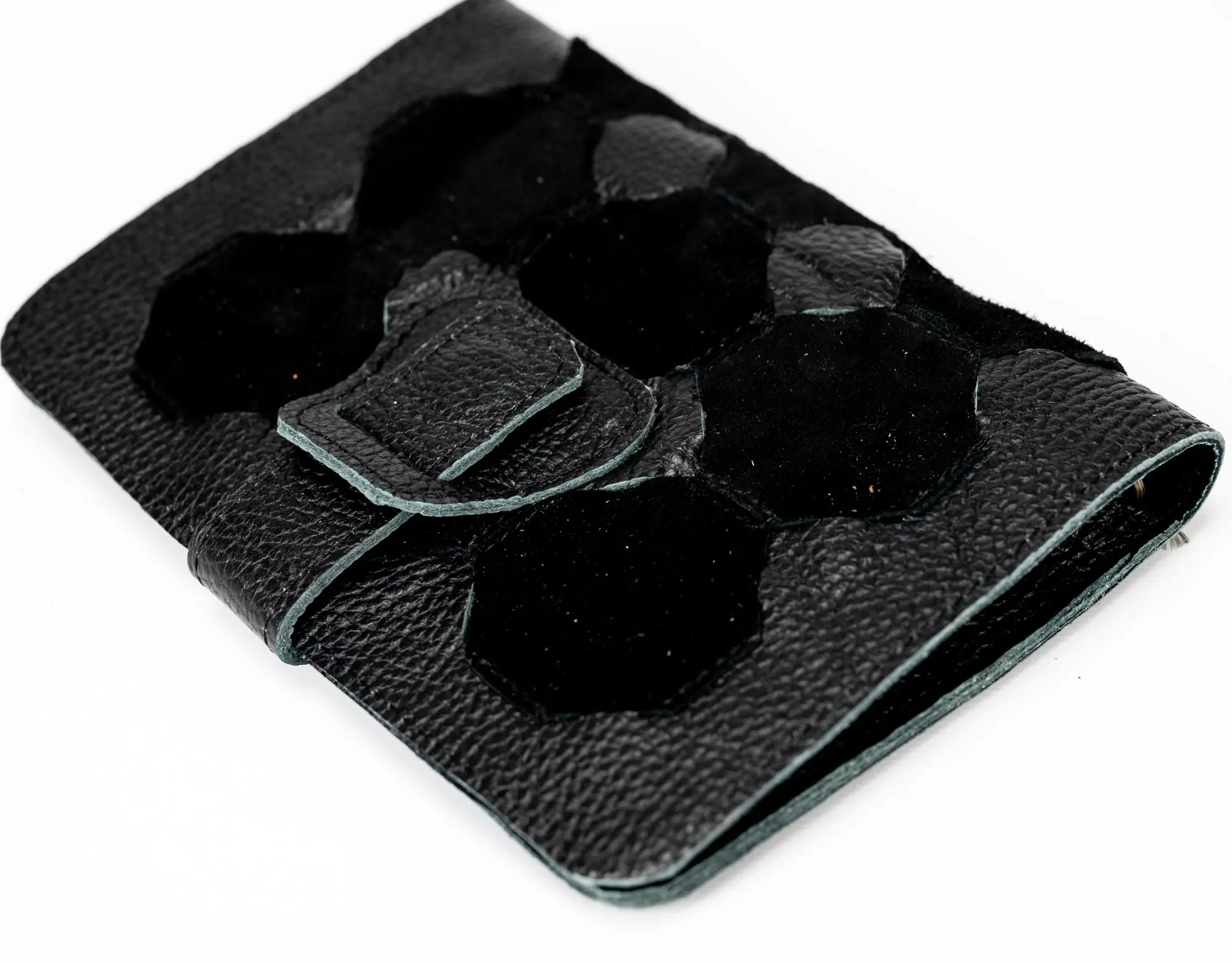 Black leather wallet with a buckle on a white background