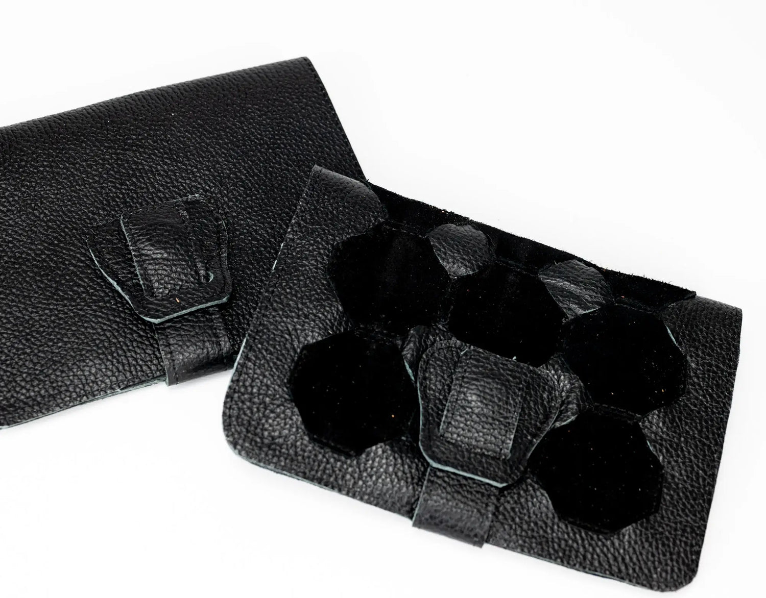 Black leather case with a strap on a white background