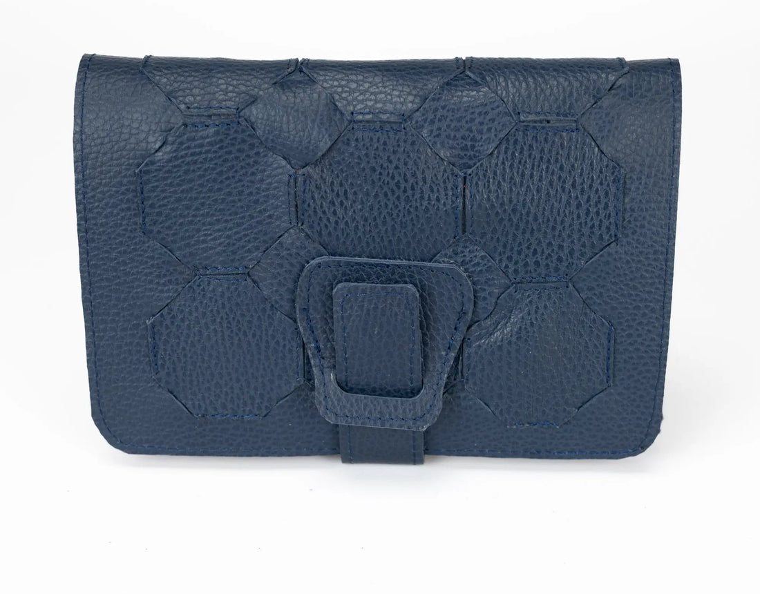 Blue textured clutch bag with a buckle on a white background