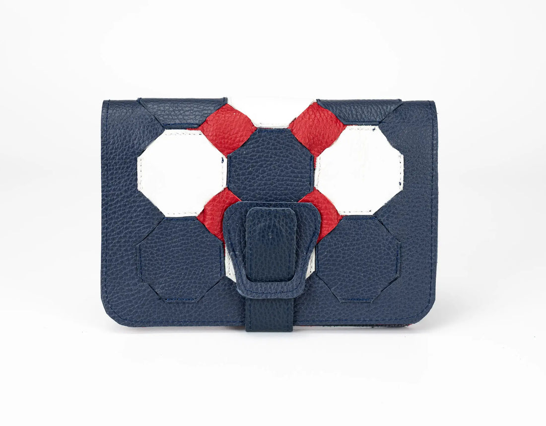 Blue and red geometric handbag on a white background