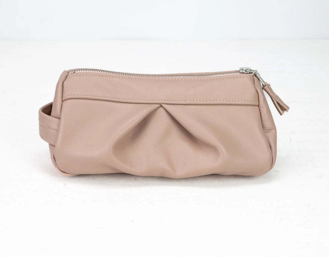 Beige handbag with a zipper on a white background