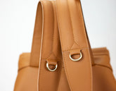 Brown leather backpack with straps