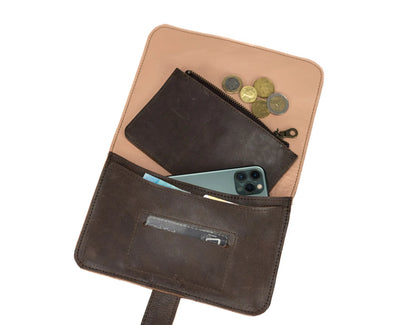 Brown leather wallet with open compartments on a white background