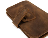 Brown leather wallet on a white background