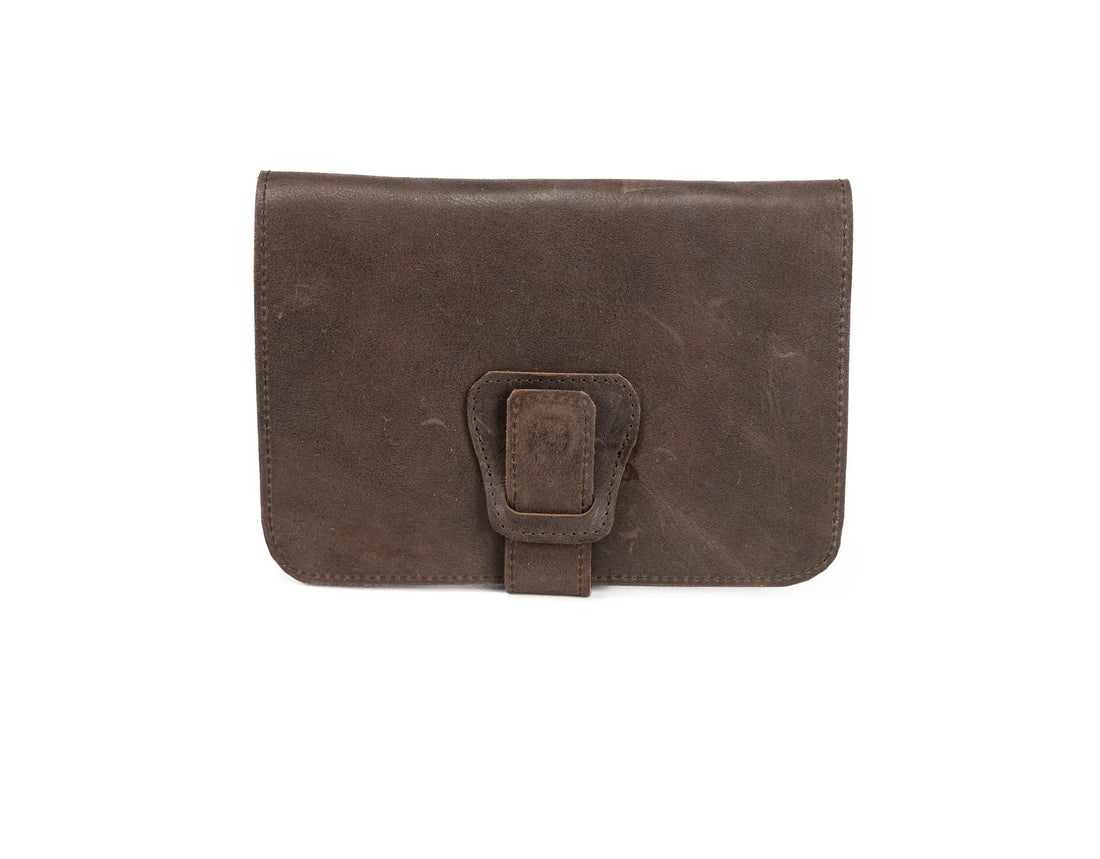 Brown leather wallet with a buckle on a white background