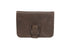 Brown leather wallet with a buckle on a white background