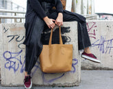 caramel leather unlined tote bag by milloo