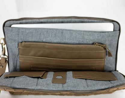 Gray bag with a brown interior pocket on a white background