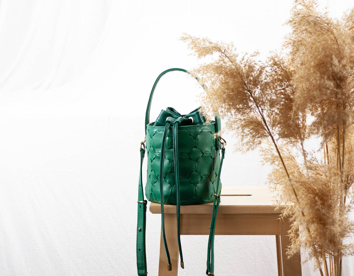 Helon mini bucket bag - Handwoven petrol green leather