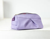 Lavender toiletry bag on a white background