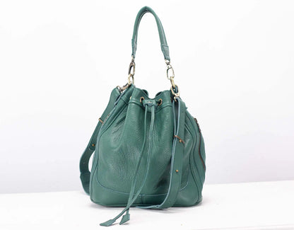 Green handbag on a white background
