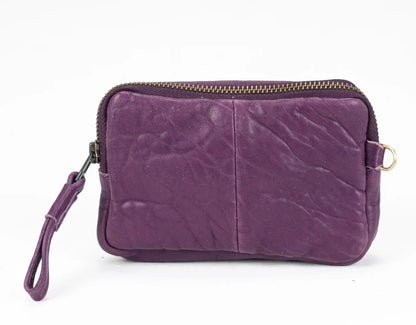 Purple leather wallet with card slots on a white background