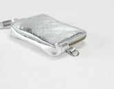 Silver textured wallet on a white background
