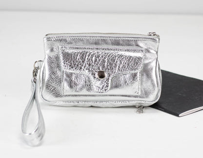 Silver clutch bag with a textured surface on a white background