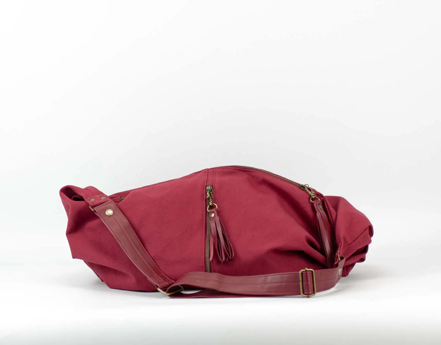 Red bag with a strap on a white background