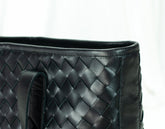 Black quilted handbag